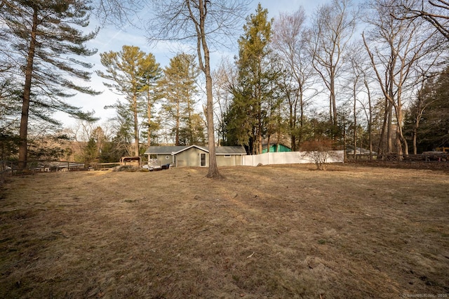 view of yard with fence