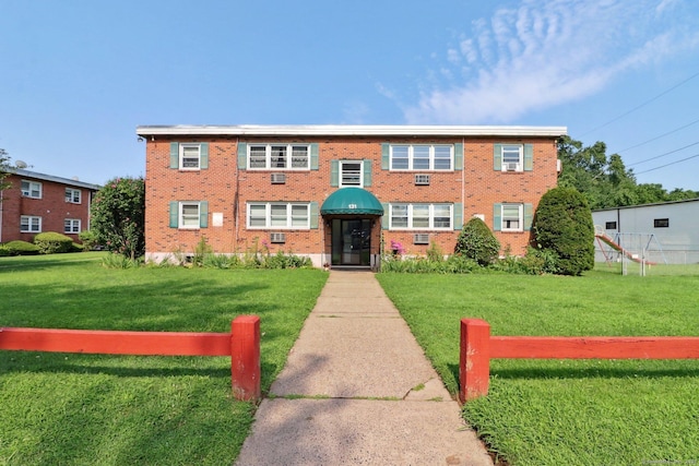 view of front of home with a front yard