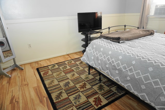 bedroom featuring hardwood / wood-style flooring