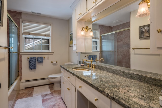 full bathroom featuring visible vents, toilet, enclosed tub / shower combo, vanity, and a baseboard heating unit