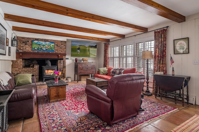 living area with beamed ceiling