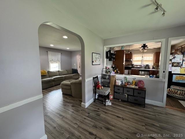 living room with dark wood-type flooring