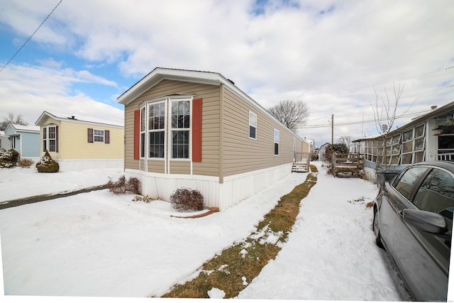 view of snow covered property