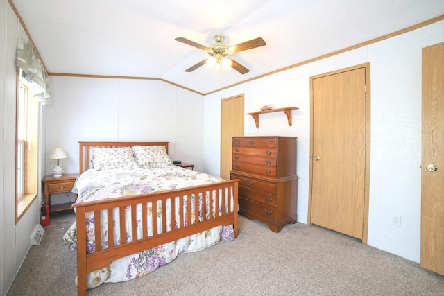 bedroom featuring ornamental molding, carpet, ceiling fan, and lofted ceiling