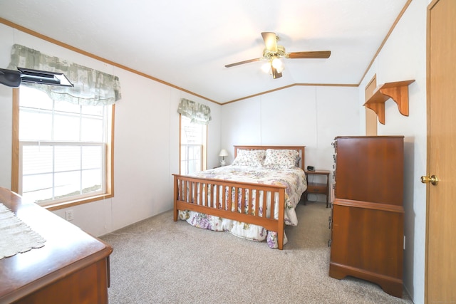 bedroom featuring ornamental molding, lofted ceiling, and multiple windows