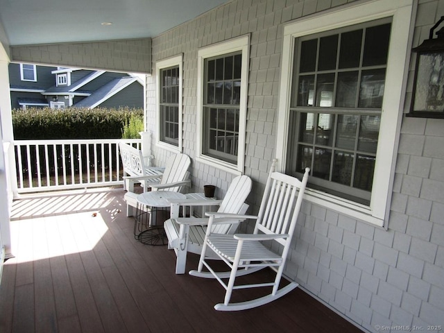 wooden deck featuring a porch