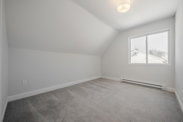 bonus room with a baseboard radiator, baseboards, lofted ceiling, and carpet