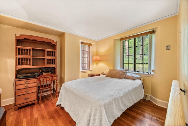 bedroom featuring hardwood / wood-style floors