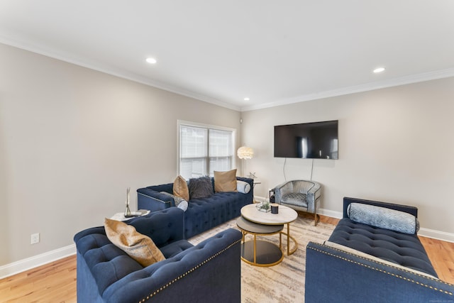 living room with ornamental molding, recessed lighting, baseboards, and wood finished floors