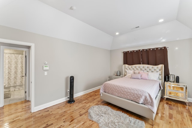 bedroom with recessed lighting, visible vents, baseboards, vaulted ceiling, and light wood-type flooring