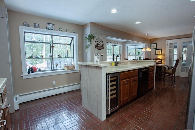 kitchen with beverage cooler, black dishwasher, a baseboard radiator, an island with sink, and french doors