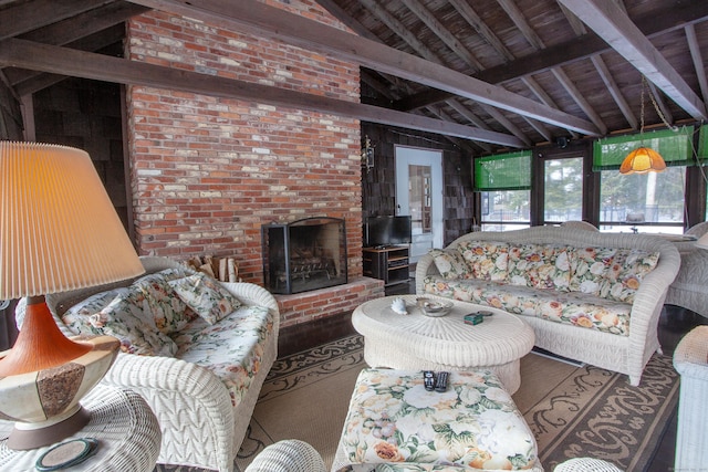 living room featuring a fireplace and lofted ceiling with beams