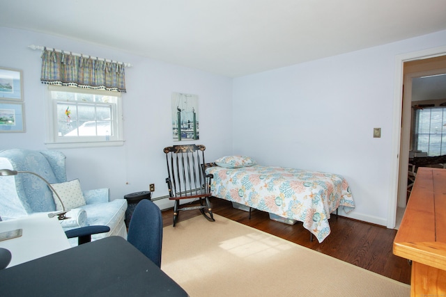 bedroom featuring dark wood-type flooring