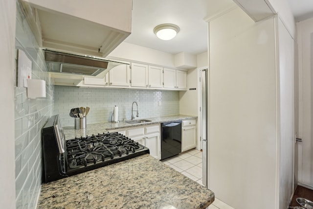 kitchen with white cabinetry, a sink, black dishwasher, range with gas cooktop, and tasteful backsplash