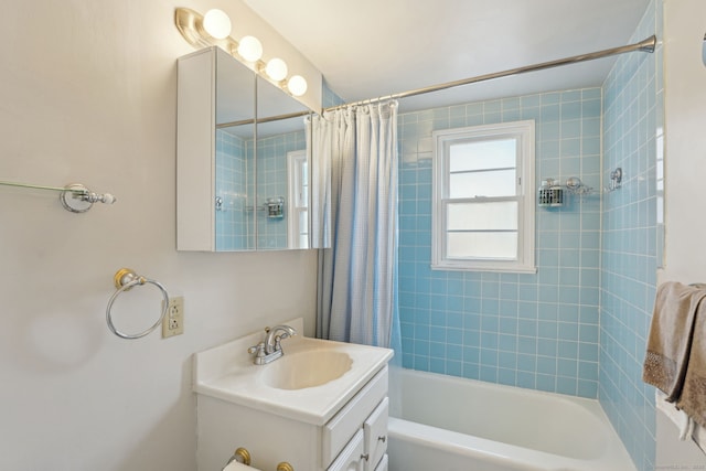 full bath with vanity and shower / tub combo