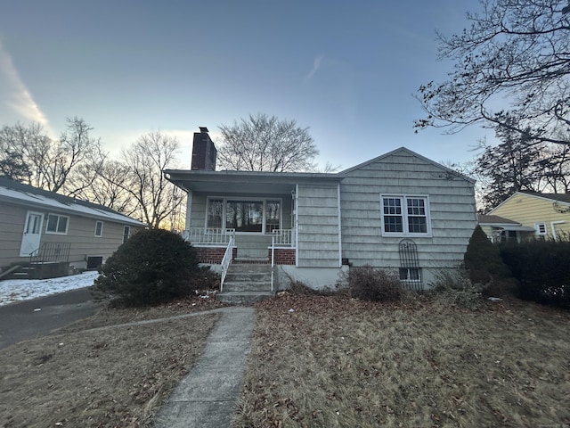 bungalow-style home featuring a porch