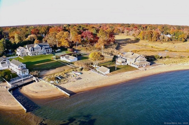 bird's eye view with a view of the beach and a water view