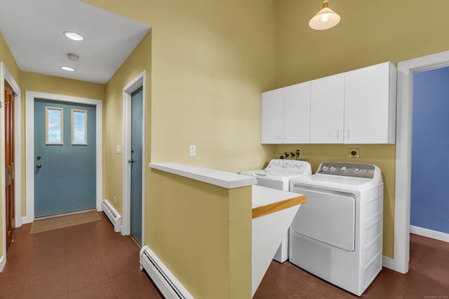 laundry area with cabinets, sink, washing machine and dryer, and a baseboard heating unit