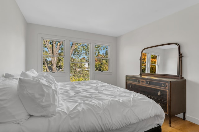 bedroom featuring light wood-type flooring