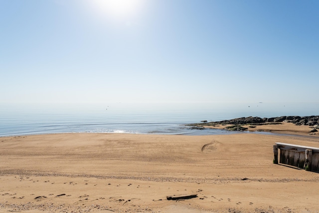 property view of water with a beach view