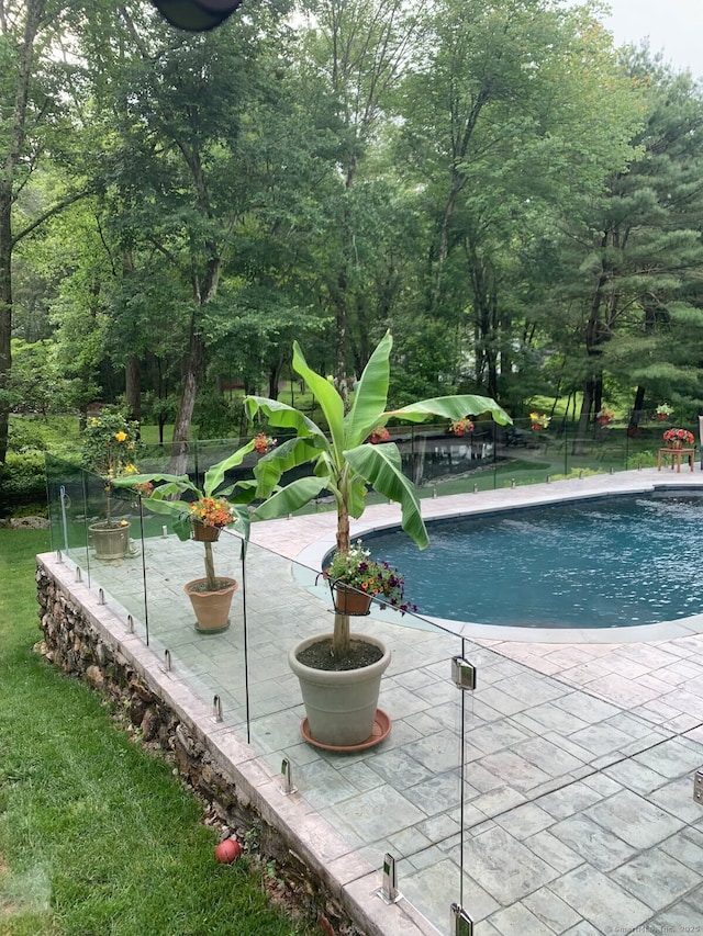 pool featuring a patio