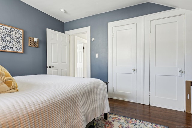 bedroom featuring dark hardwood / wood-style floors