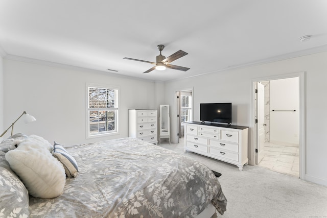 carpeted bedroom with crown molding, ceiling fan, and ensuite bath