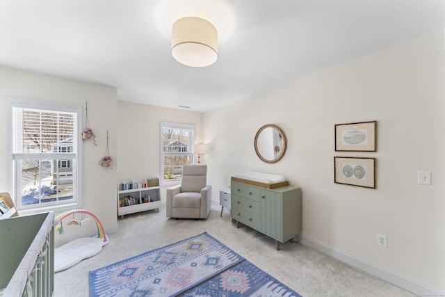 bedroom with light colored carpet