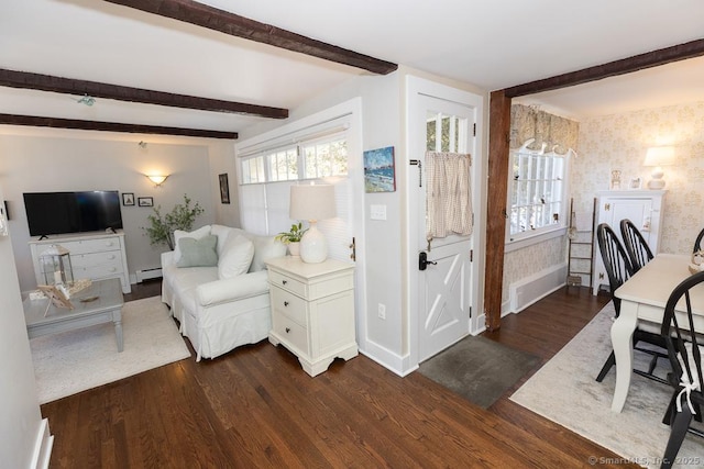 interior space featuring dark hardwood / wood-style flooring, a baseboard radiator, and beamed ceiling