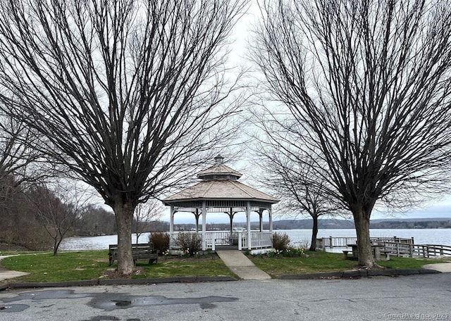 view of home's community featuring a gazebo and a water view