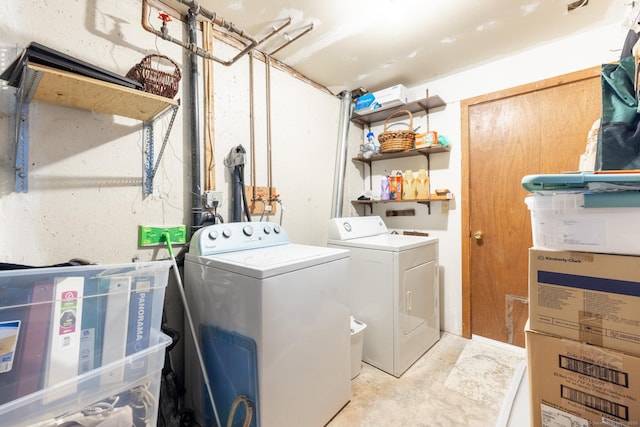 laundry room featuring laundry area and washer and clothes dryer