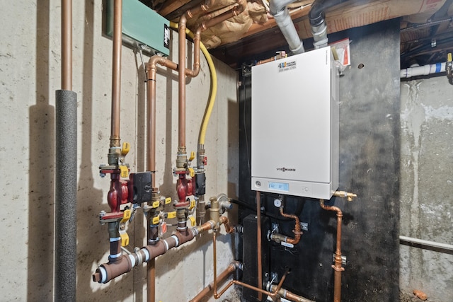 utility room with water heater