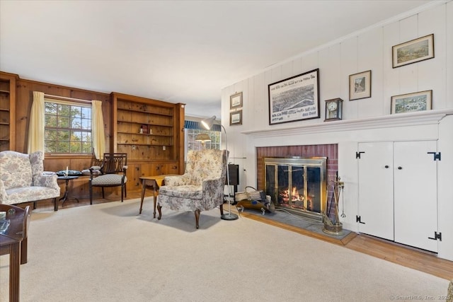 31 Pawson Rd, Branford, CT 06405 - living area with a brick fireplace, crown molding, and light colored carpet