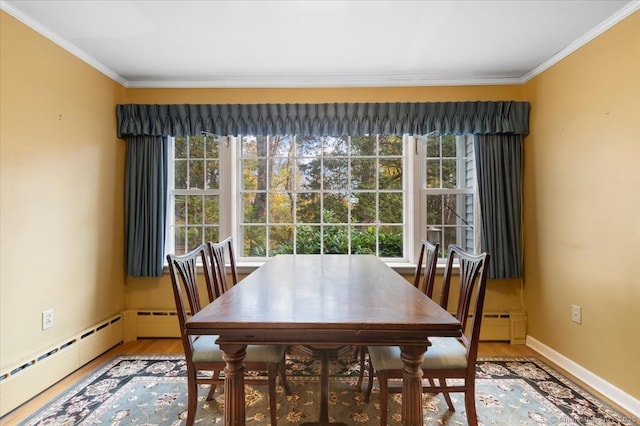 31 Pawson Rd, Branford, CT 06405 - dining space with ornamental molding, a wealth of natural light, baseboards, and wood finished floors