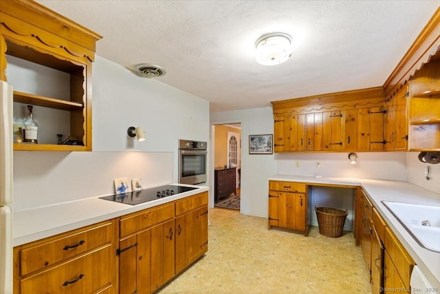 31 Pawson Rd, Branford, CT 06405 - kitchen with open shelves, light countertops, a sink, oven, and black electric cooktop