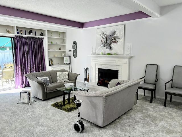 living area with a textured ceiling, carpet flooring, baseboards, a brick fireplace, and beam ceiling