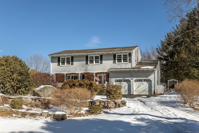 view of front of house featuring brick siding