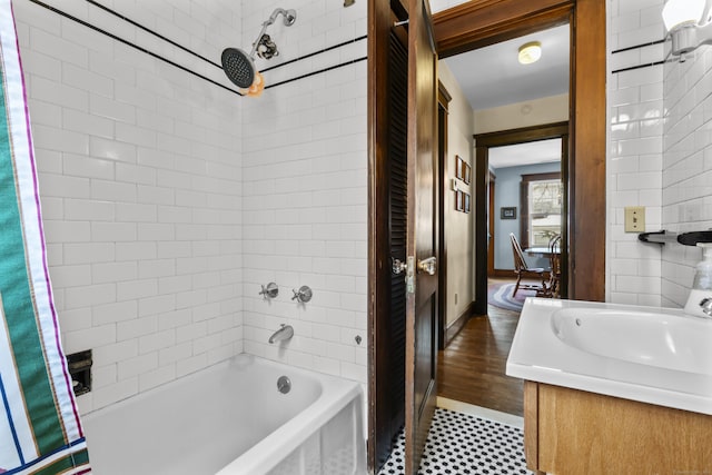 bathroom with vanity and shower / bathtub combination with curtain