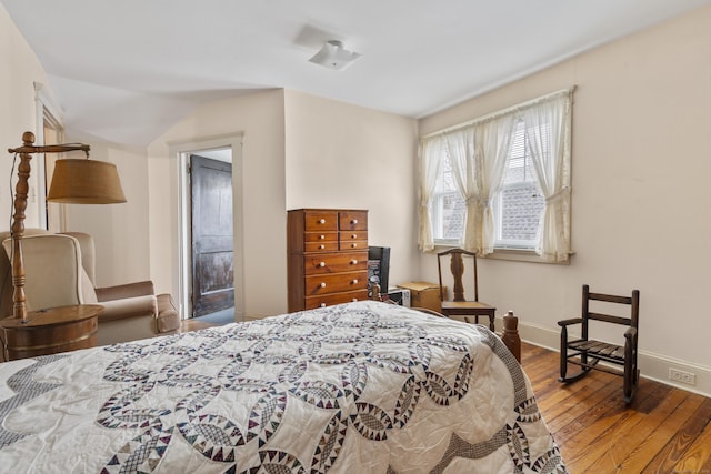 bedroom featuring hardwood / wood-style flooring