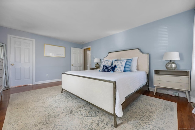 bedroom featuring dark wood-type flooring