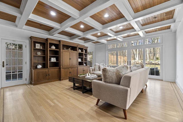 living room featuring light wood-type flooring, wooden ceiling, and beamed ceiling