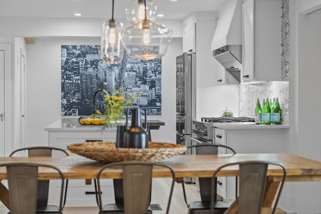 dining room featuring recessed lighting