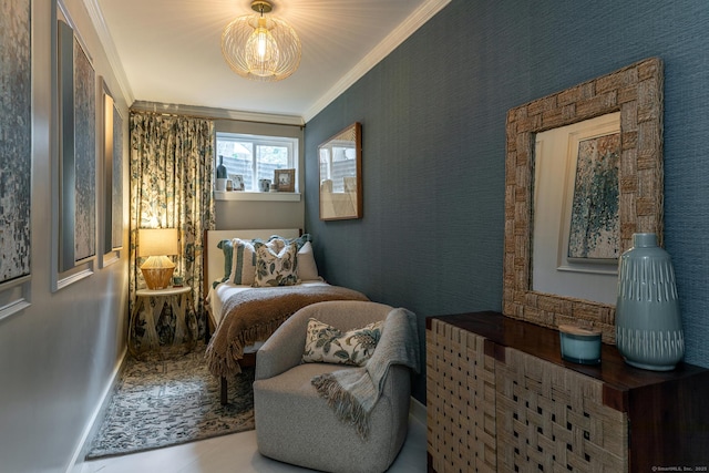 bedroom featuring crown molding and baseboards