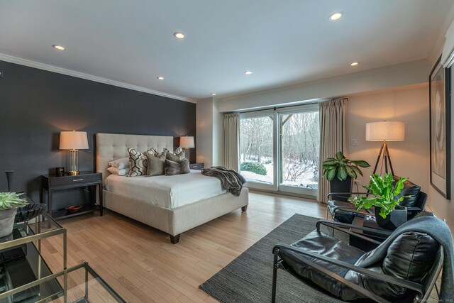 bedroom with recessed lighting, light wood-style flooring, and crown molding