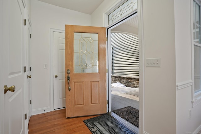 entrance foyer with light hardwood / wood-style flooring