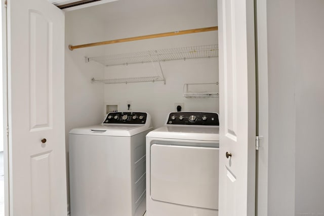 laundry area featuring independent washer and dryer