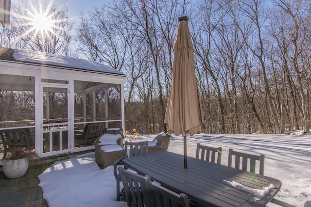 snow covered patio with a gazebo