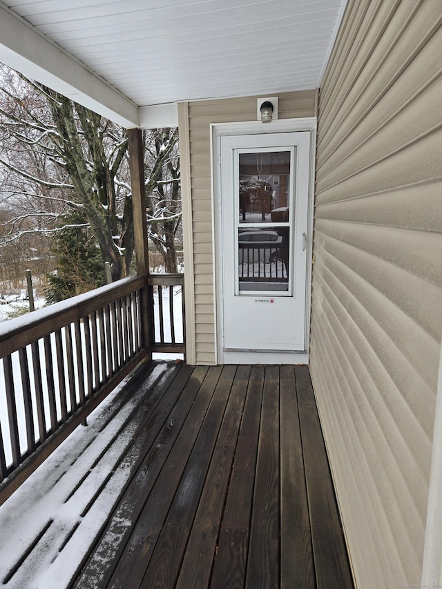 view of snow covered deck