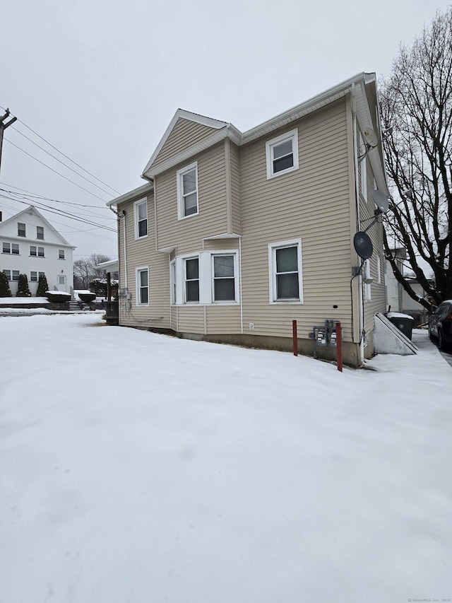 view of snow covered property