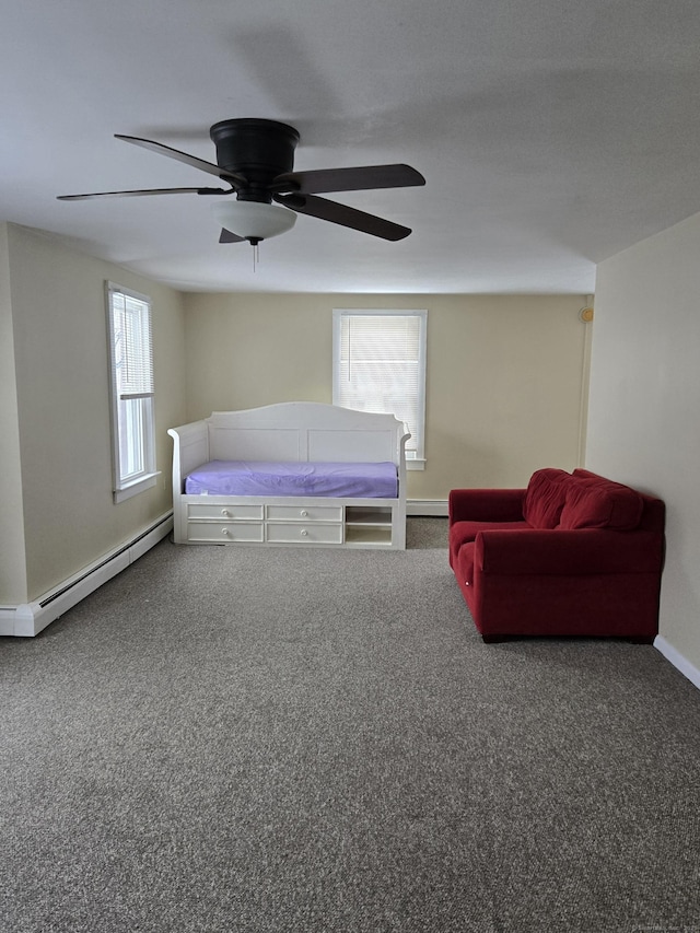 bedroom featuring baseboards, a ceiling fan, baseboard heating, and carpet flooring